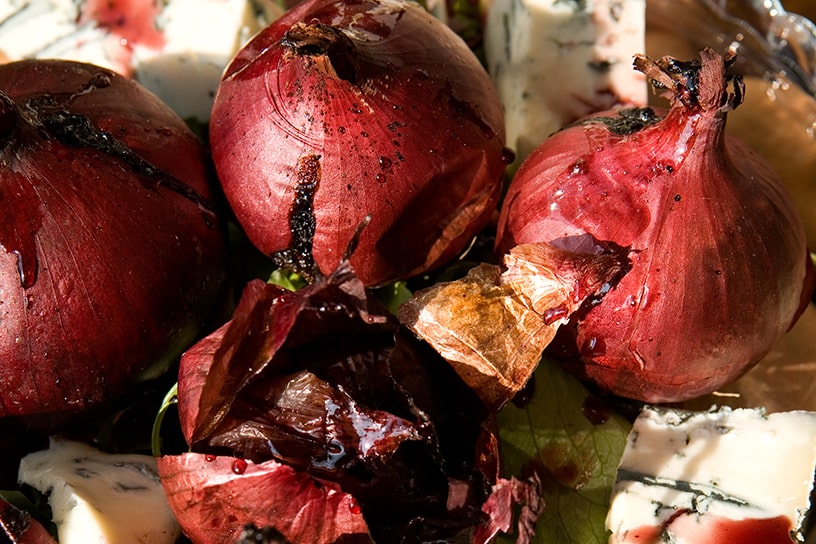 Gepofte uien met kaas